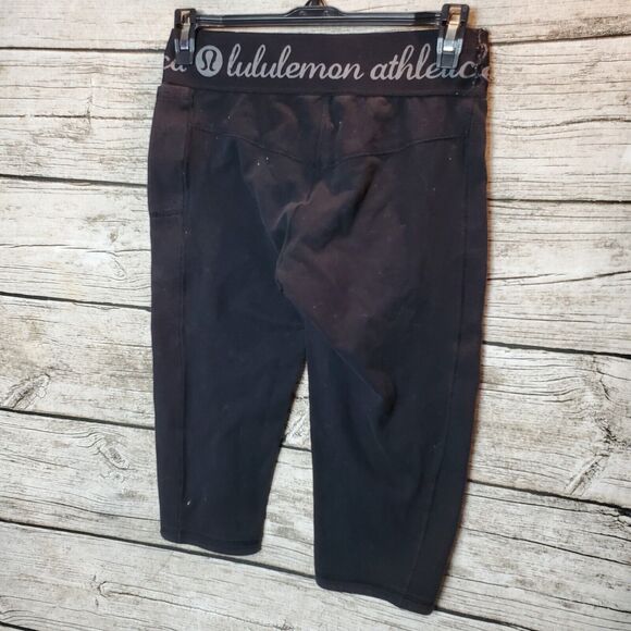 Lululemon Inner Essence Crop Spell Out Logo Waist Pockets Cropped Leggings FLAW - Picture 6 of 7